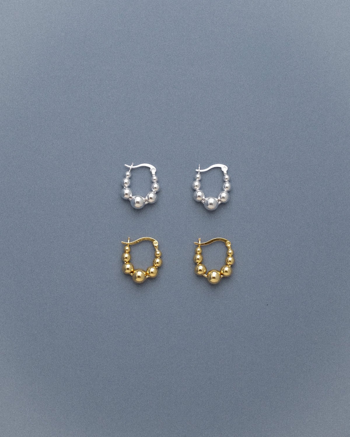 Roa Flowing Ball Hoop Earrings