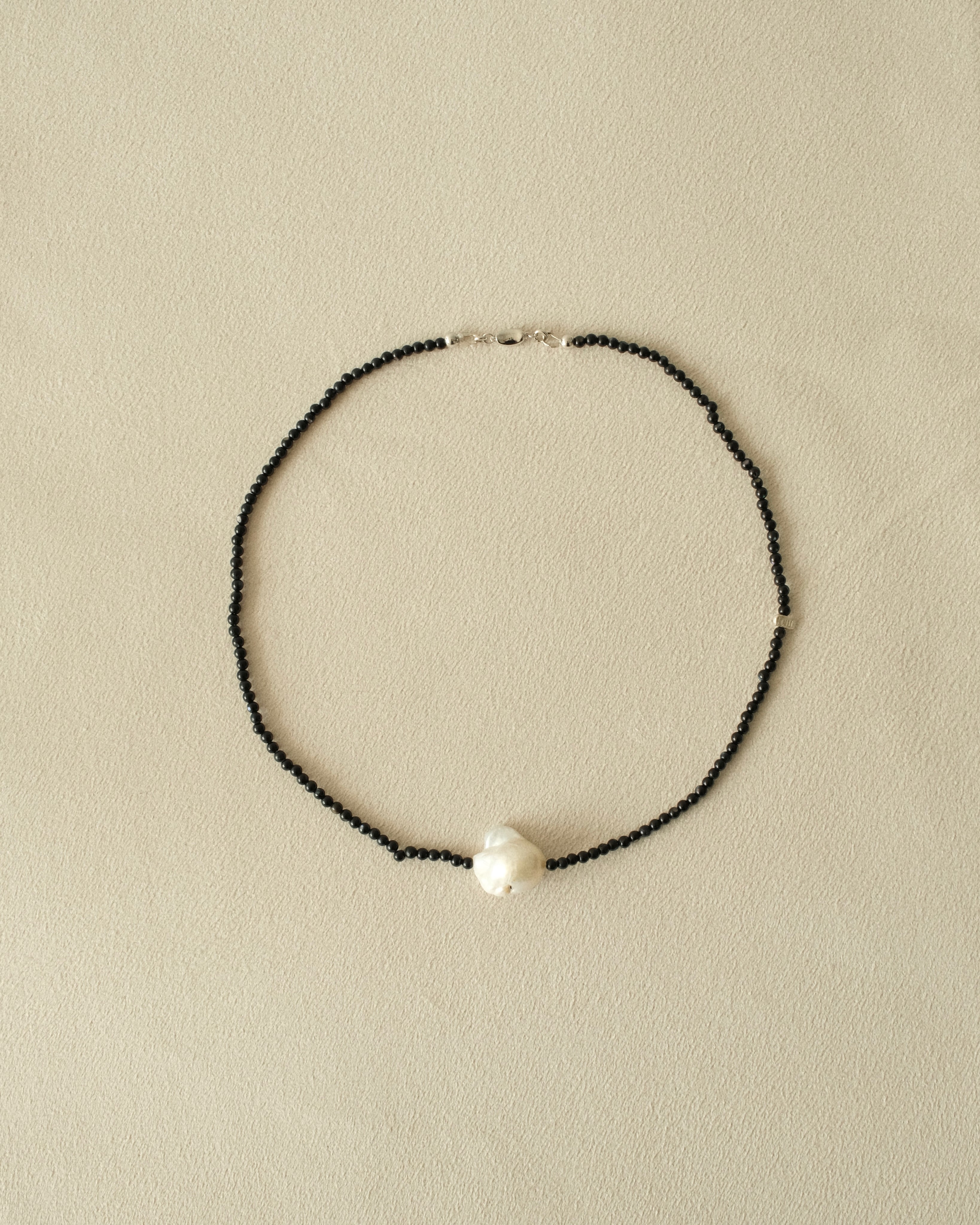 His Pearl Necklace
