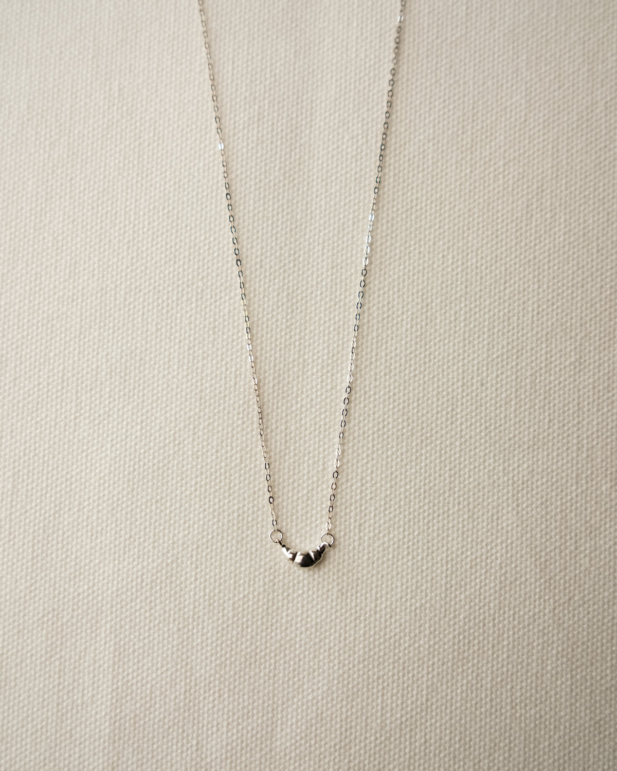 Pli Croissant Pendant Necklace