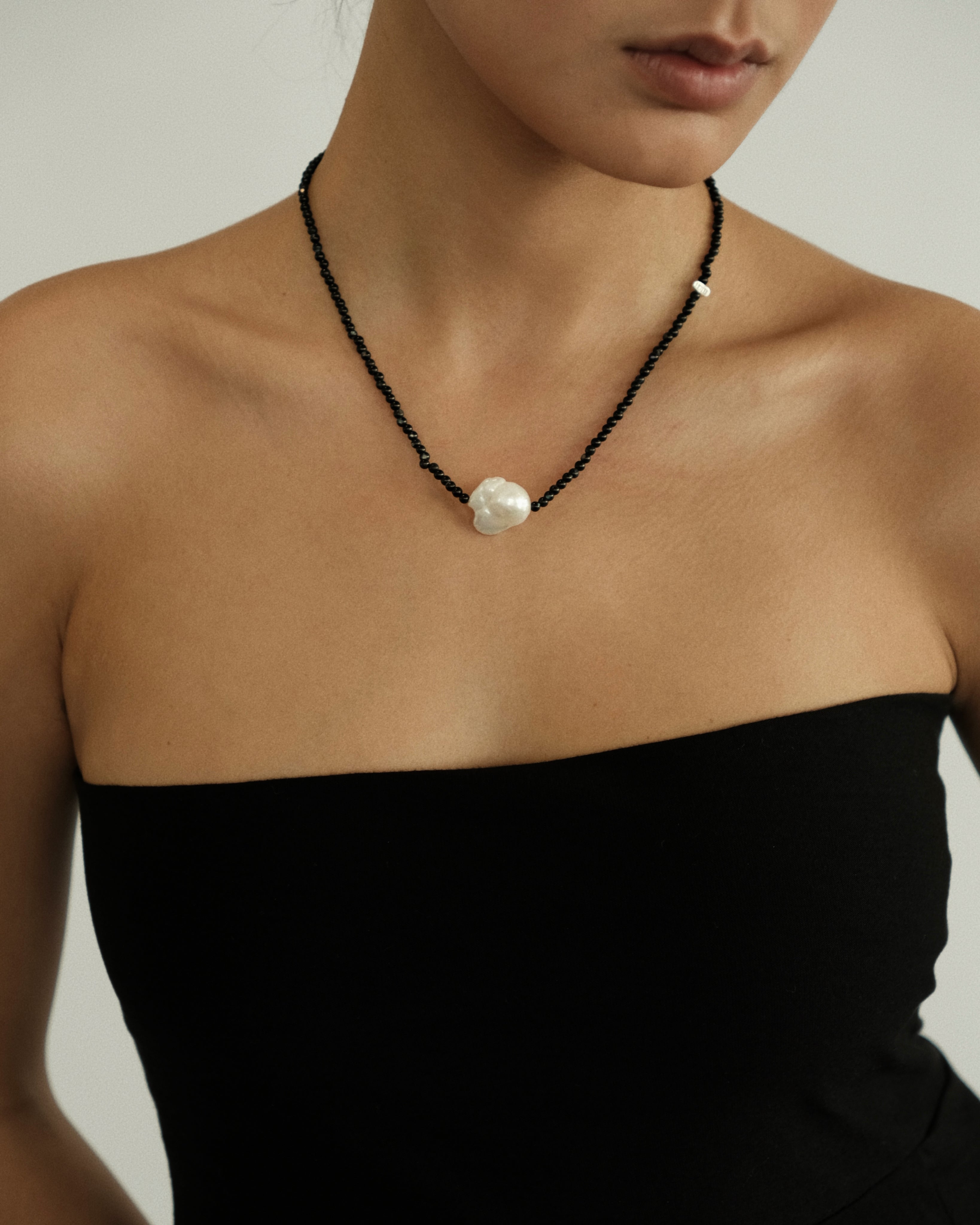 His Pearl Necklace