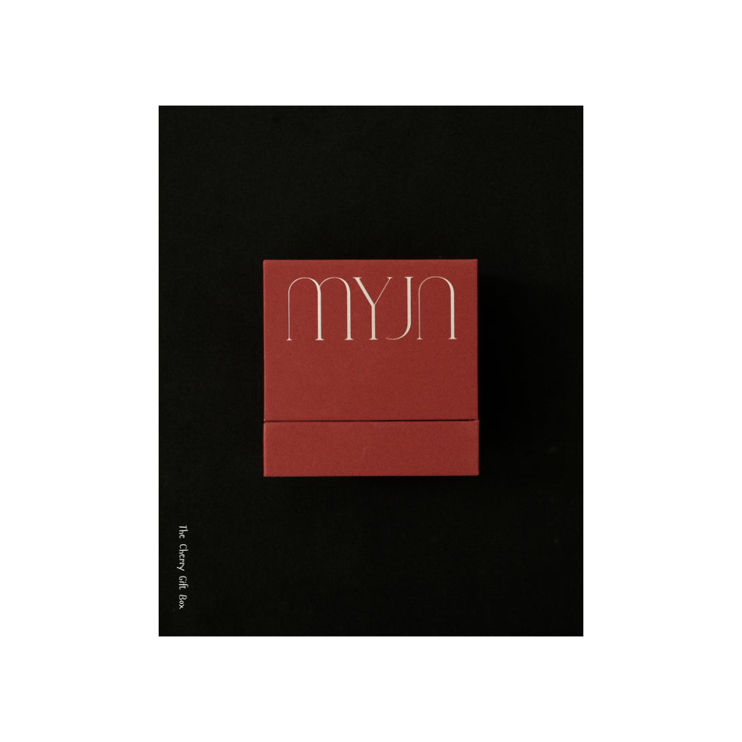 MYJN Cherry Edition box in cherry-stone paper