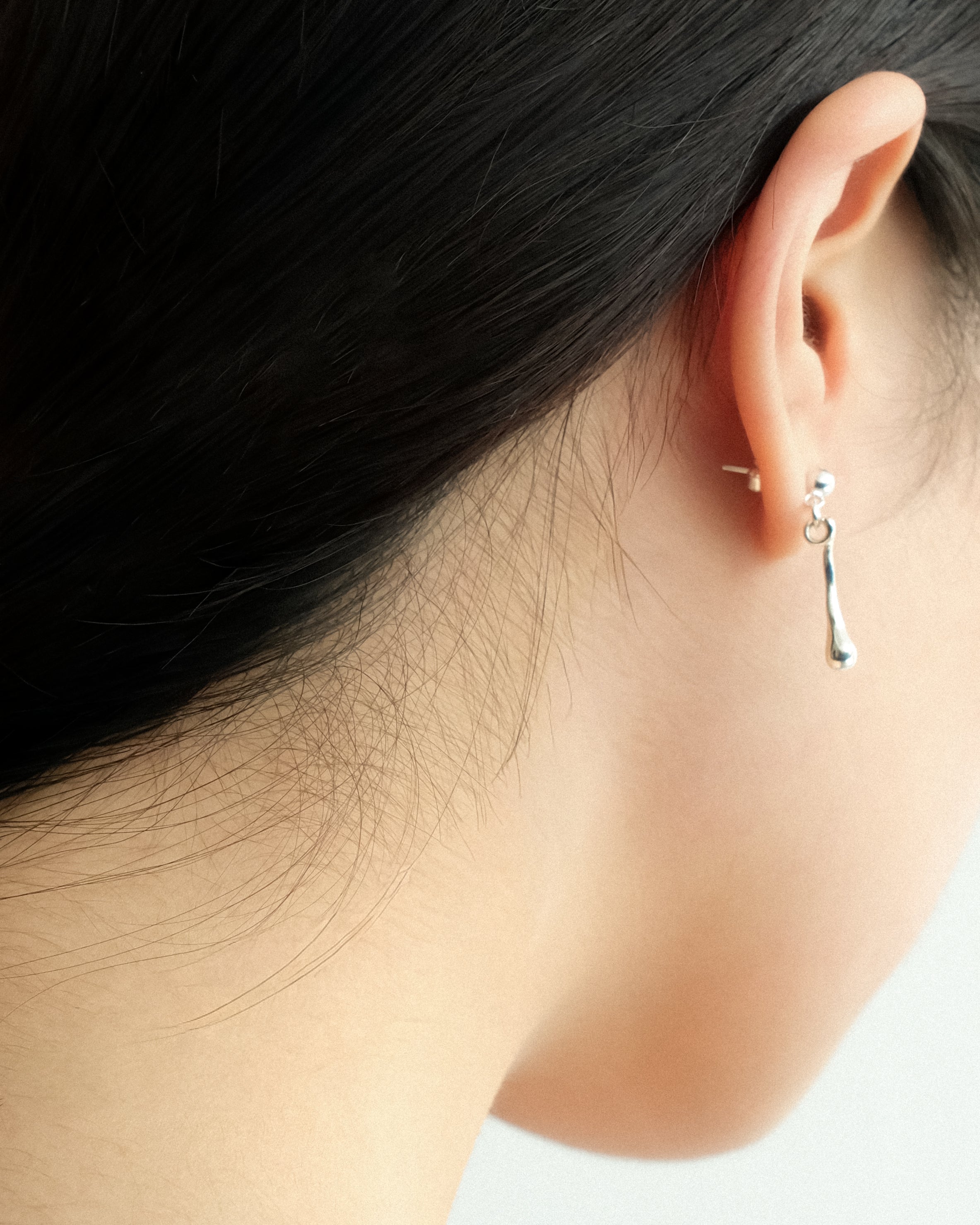 Freja Fluid Drop Stud Earrings