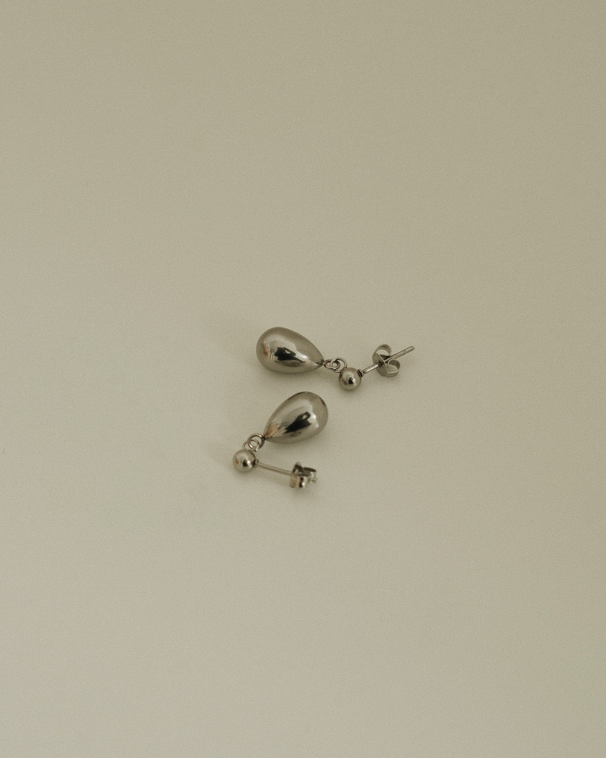 Livia Dangling Stud Earrings