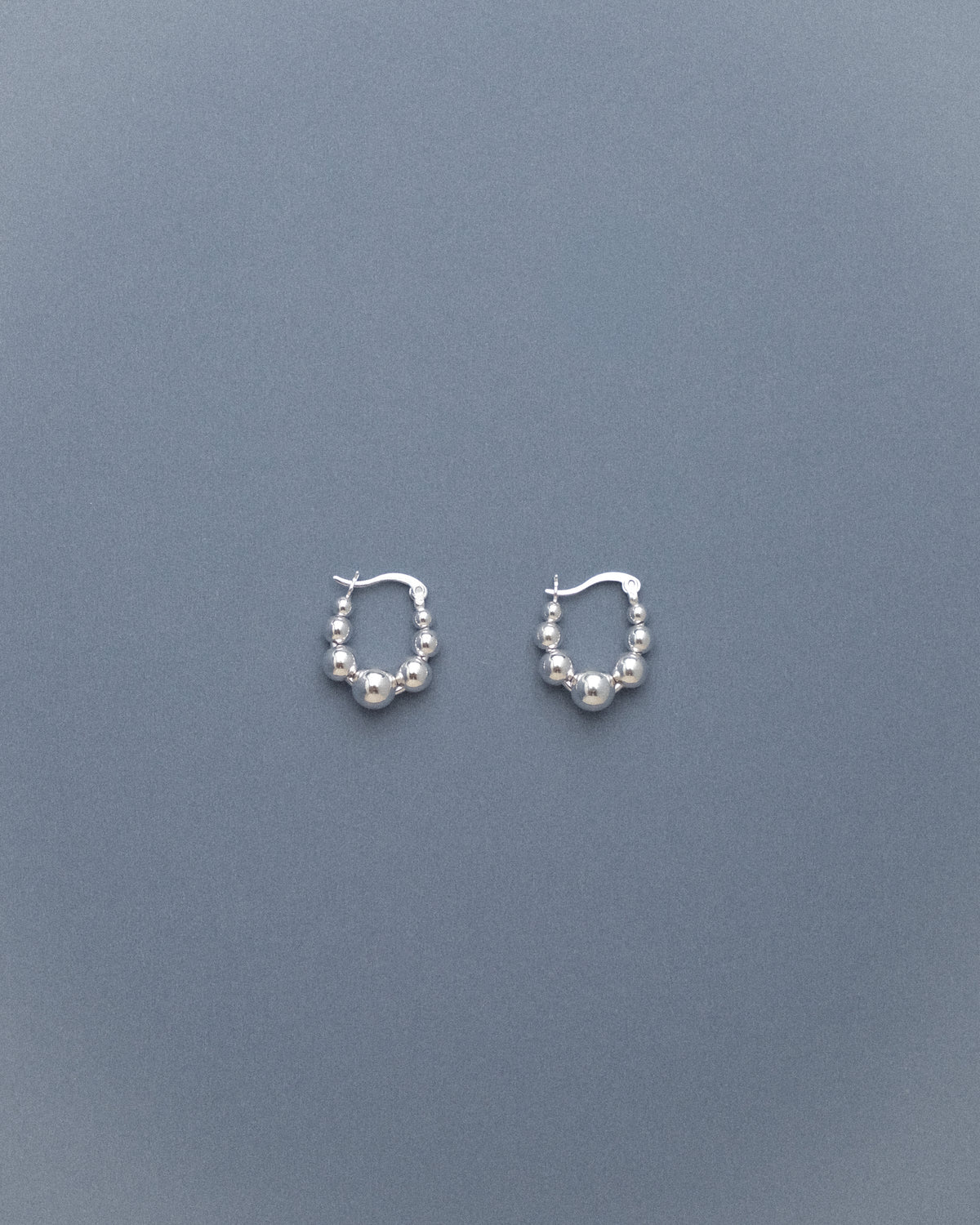 Roa Flowing Ball Hoop Earrings