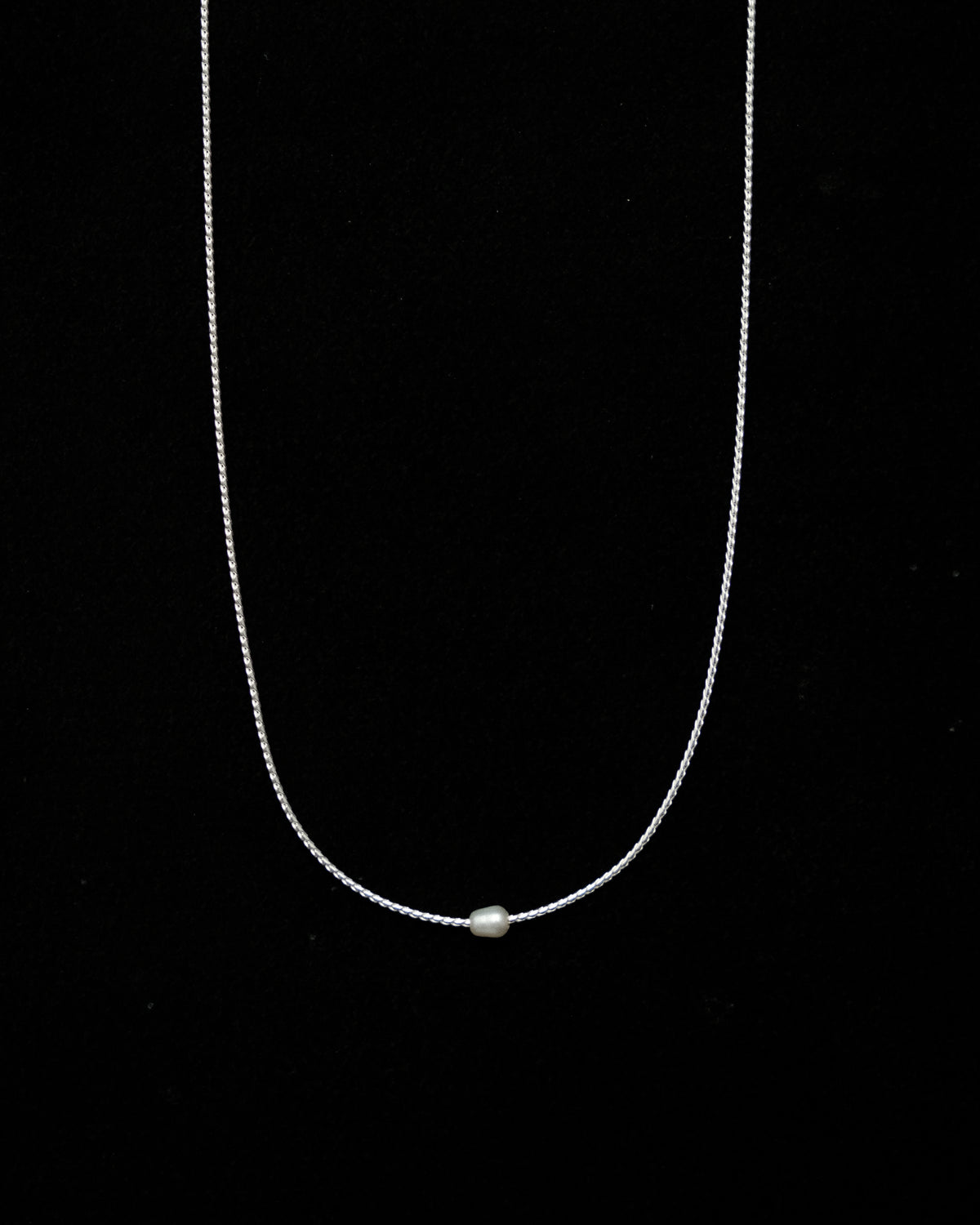 Tyla Tiny Pearl Pendant Necklace