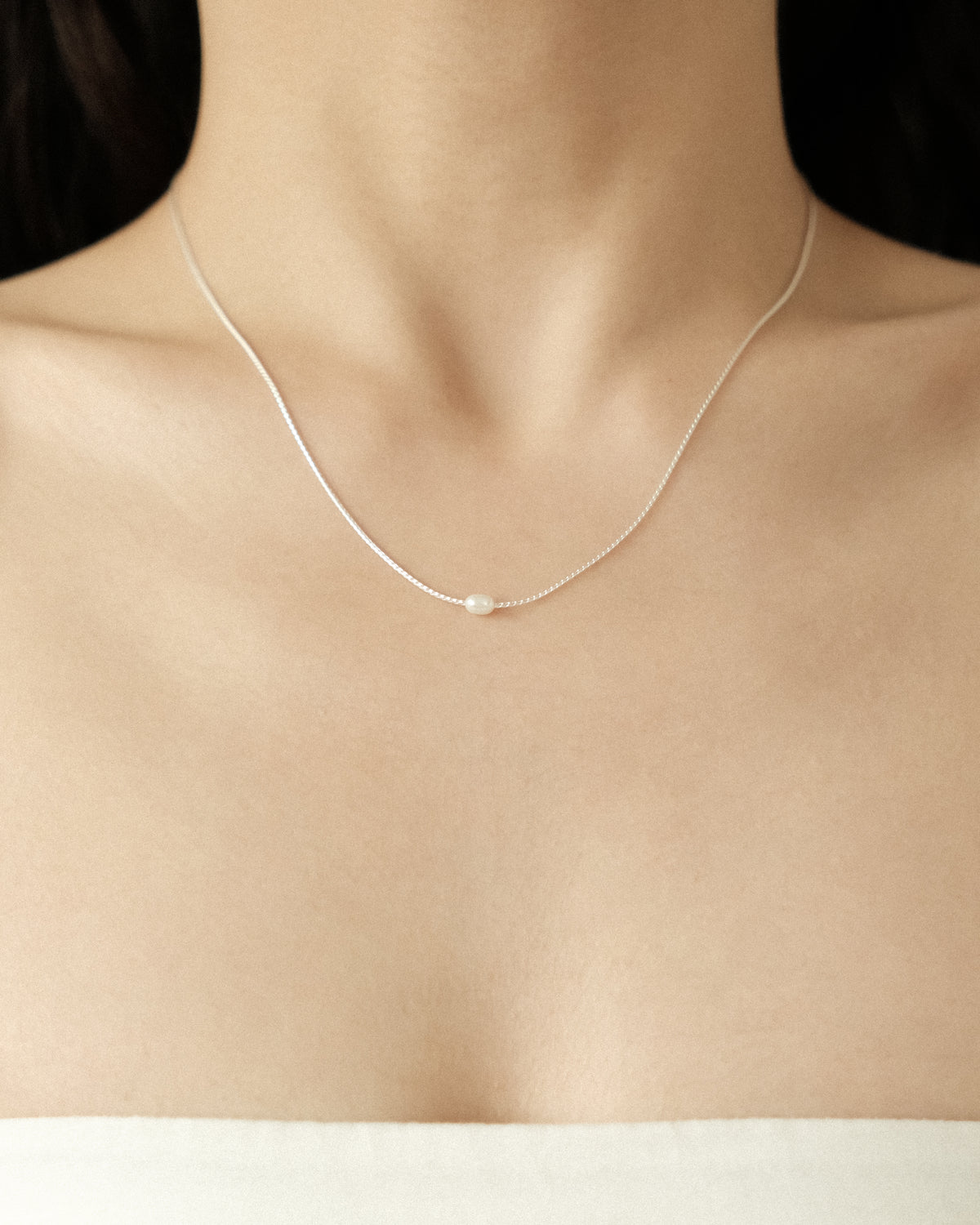 Tyla Tiny Pearl Pendant Necklace