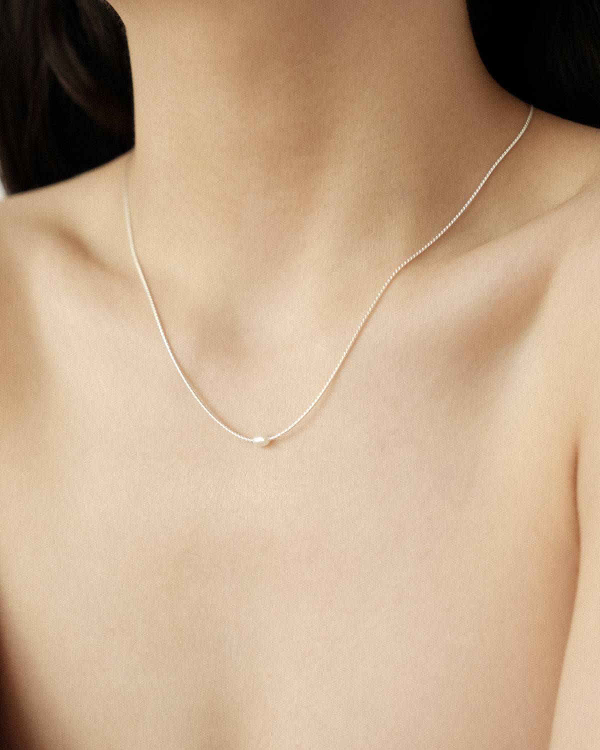 Tyla Tiny Pearl Pendant Necklace