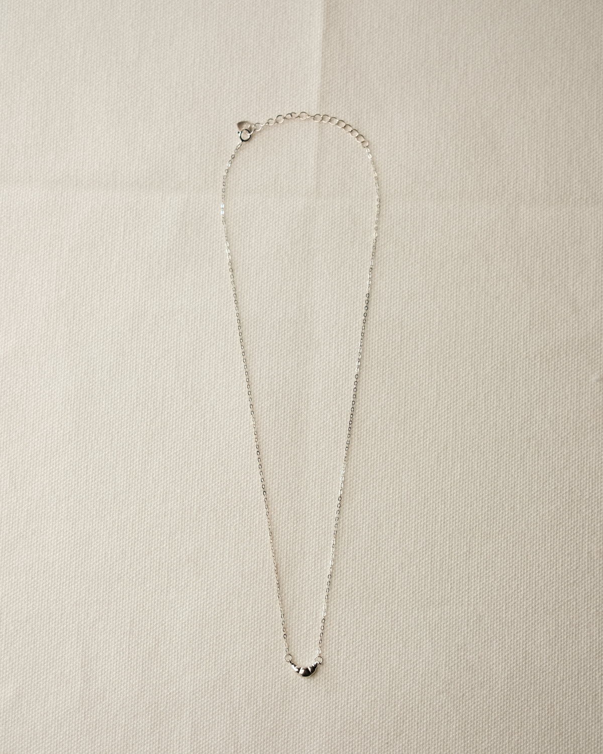 Pli Croissant Pendant Necklace