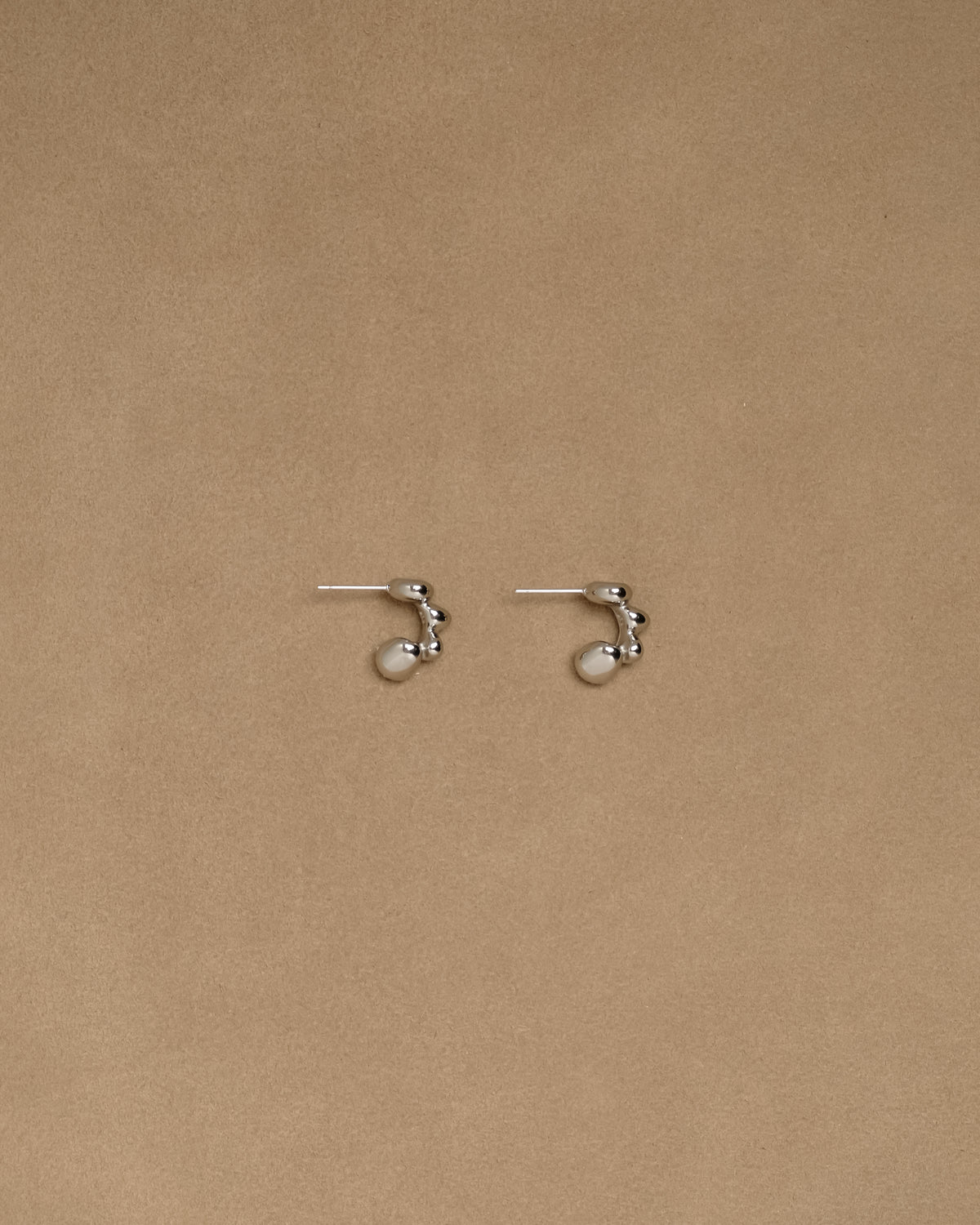 Ebur Irregular Hoop Stud Earrings