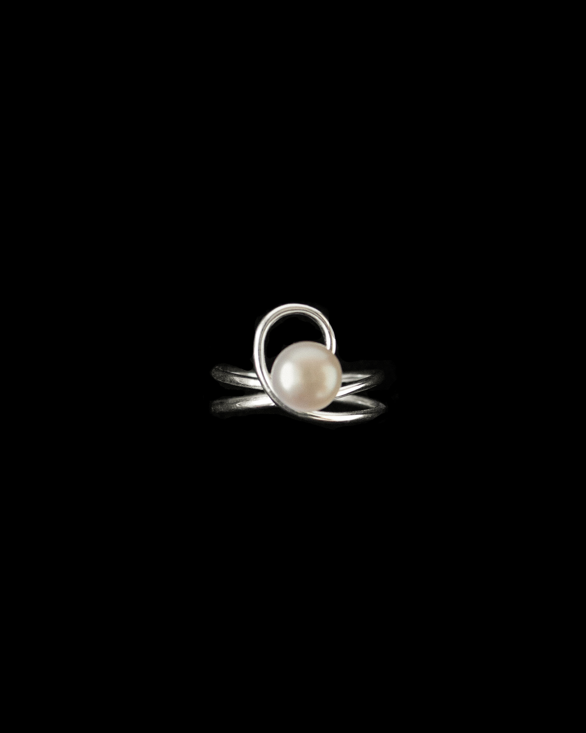 Diadem line fresh water pearl ring in silver on a black background